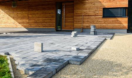 De tuin bestraten